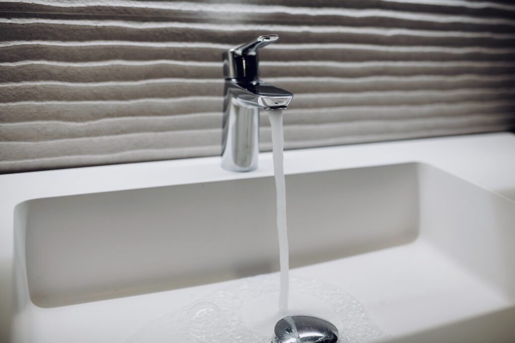 Water coming out of a faucet