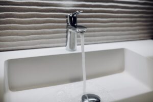 Water coming out of a faucet
