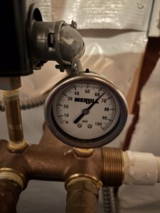 Gauge showing water pressure in the basement of an Indiana home