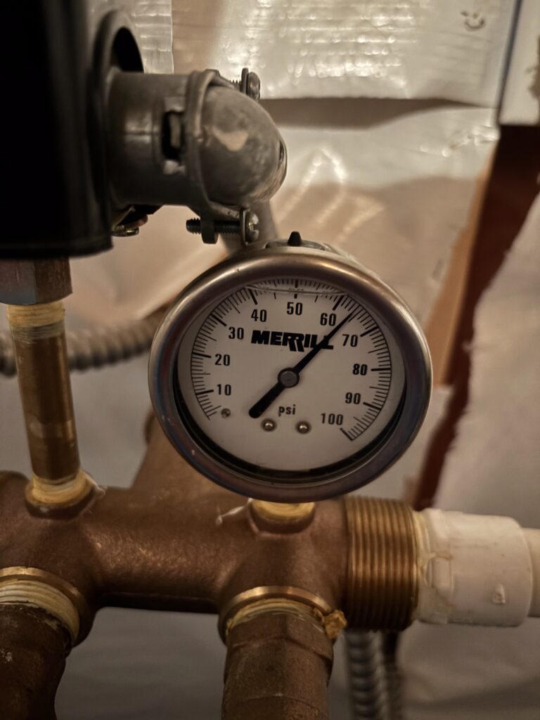 Gauge showing water pressure in the basement of an Indiana home